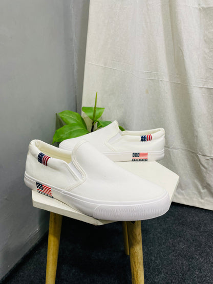 Men’s White Canvas Slip-ons