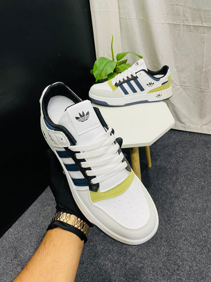 White Sneakers with Blue Stripes and Yellow Accents – Trendy and Comfortable