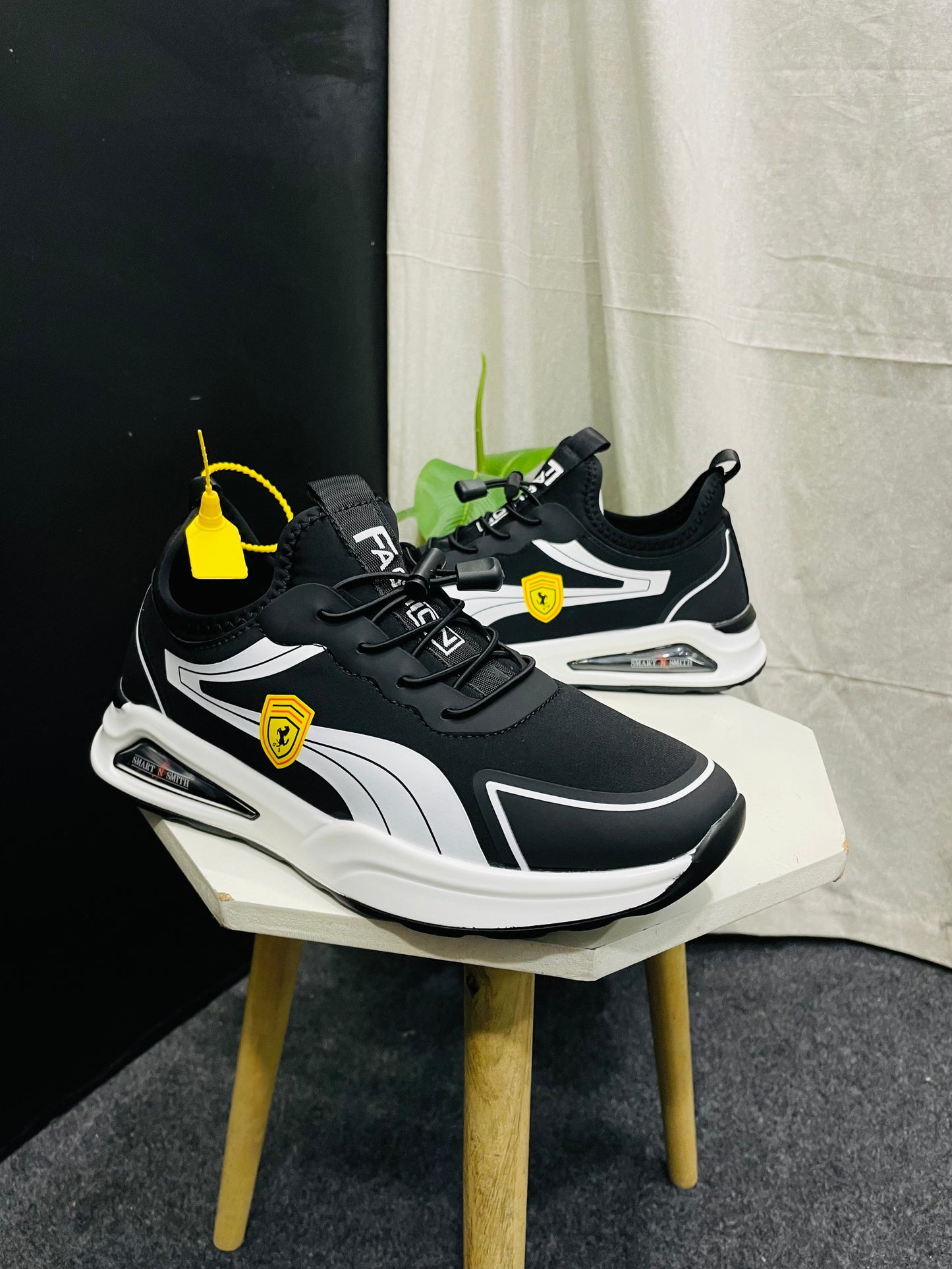 Black Sneakers with White Accents and Yellow Shield – Branded Baba