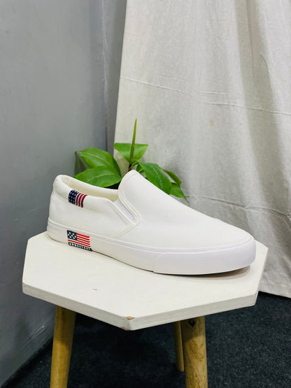 Men’s White Canvas Slip-ons