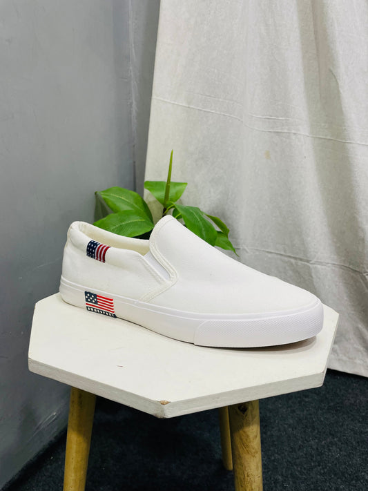 Men’s White Canvas Slip-ons