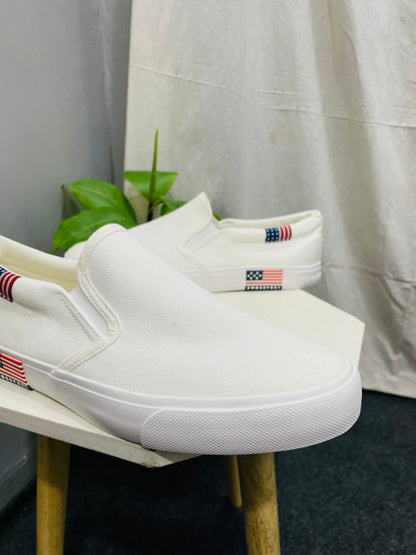 Men’s White Canvas Slip-ons