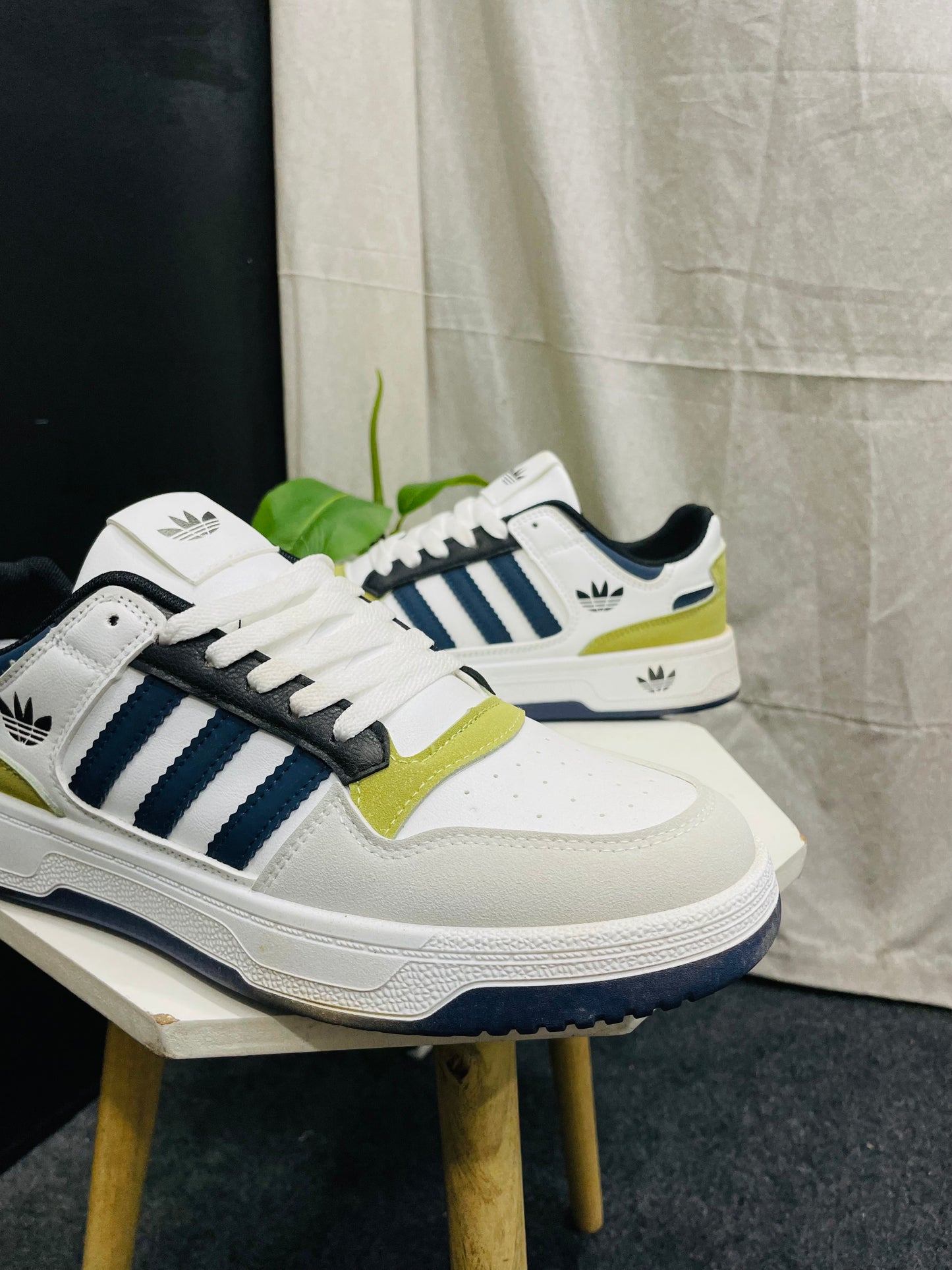 White Sneakers with Blue Stripes and Yellow Accents – Trendy and Comfortable