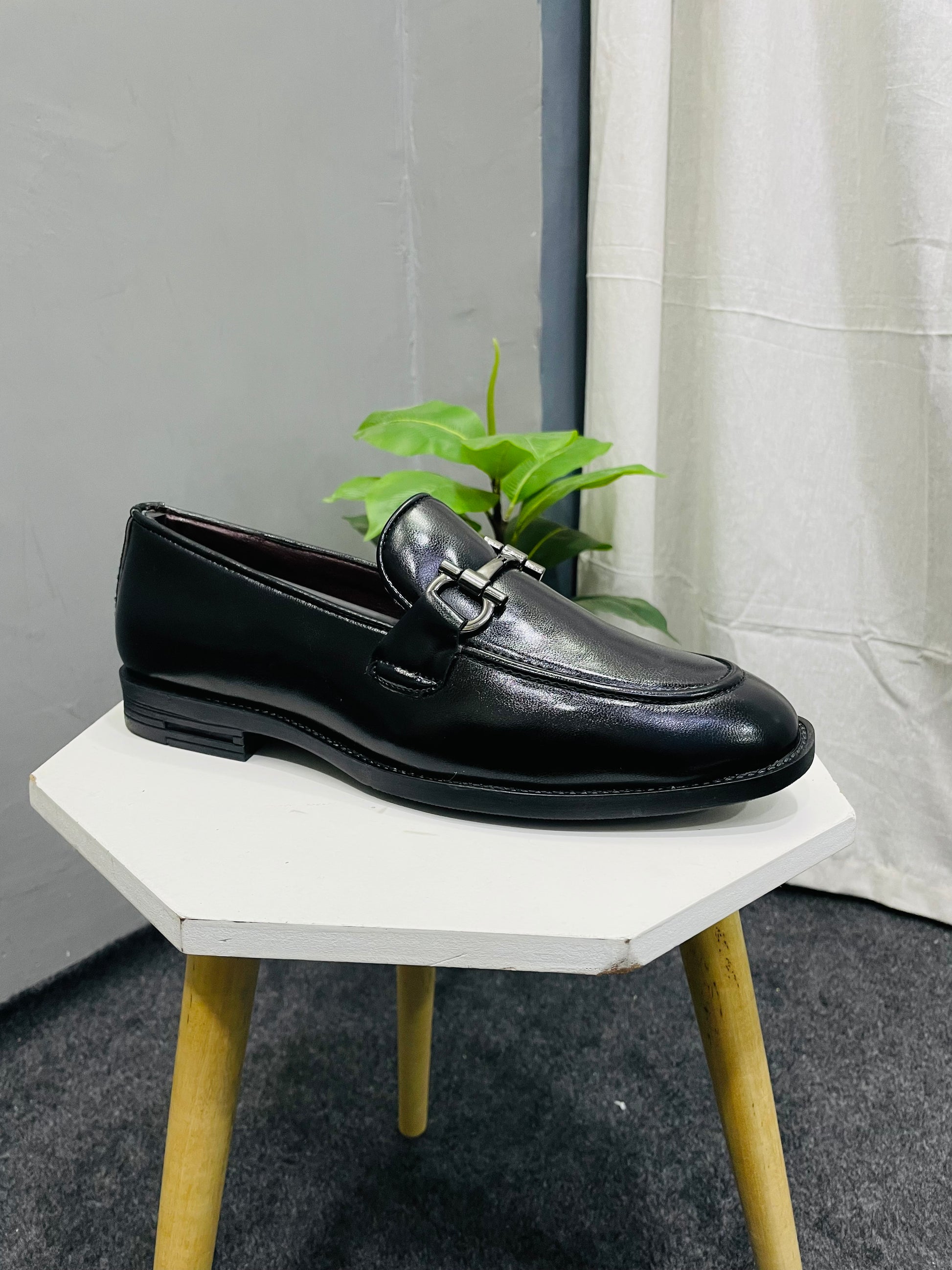 Buy MEN’S BLACK COLOUR LATEST SLIP ON WITH METAL ACCENT