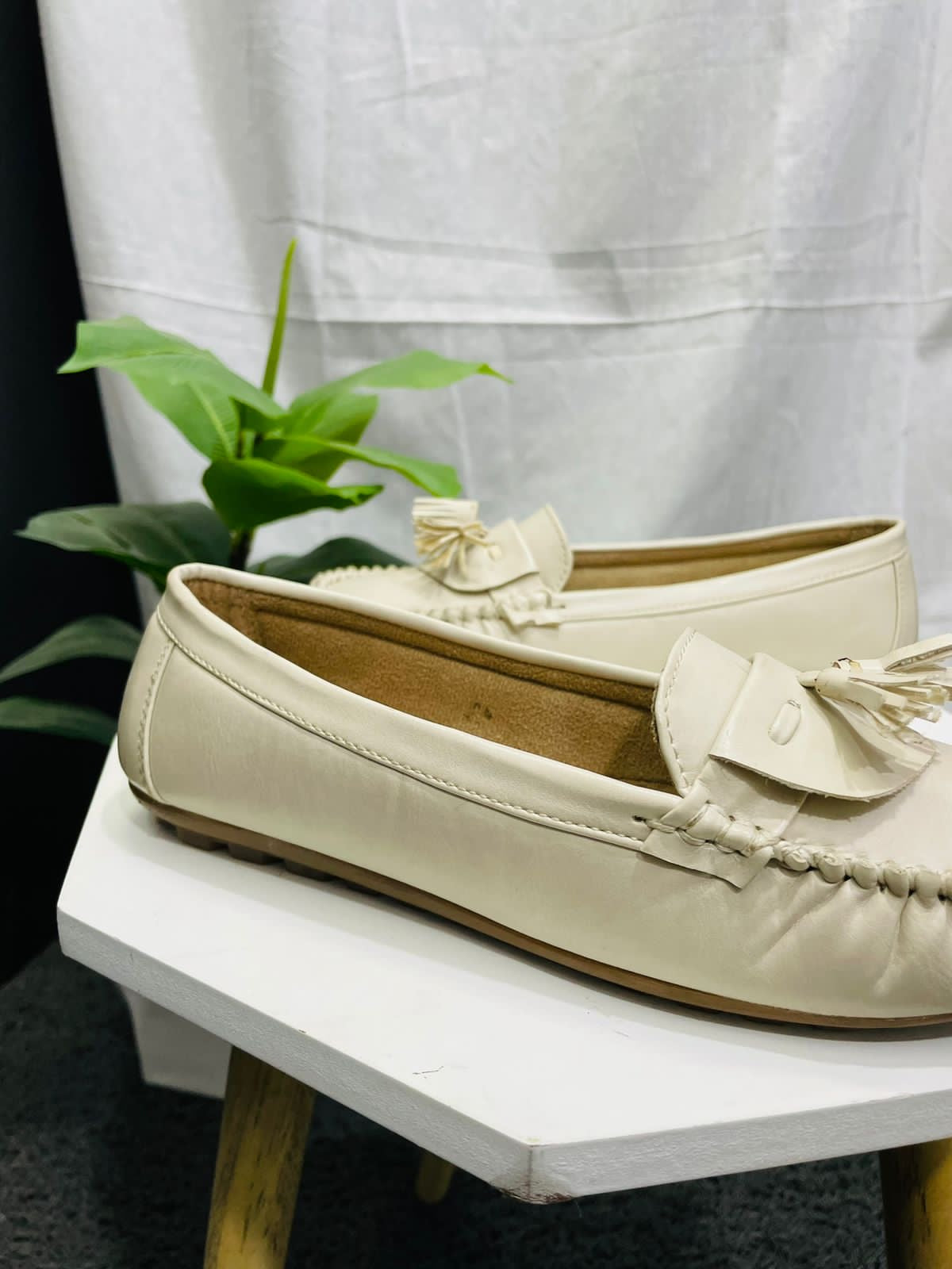 Off White Round-Toe Loafers with Metal Accent