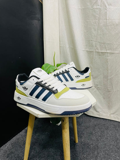 White Sneakers with Blue Stripes and Yellow Accents – Trendy and Comfortable