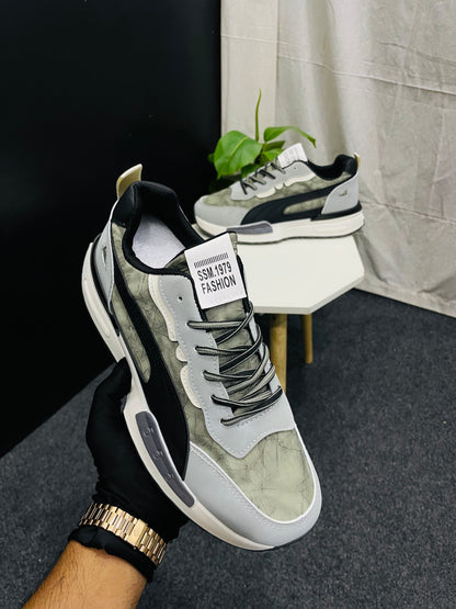 Trendy Green, Black, and White Sneakers with Modern Design